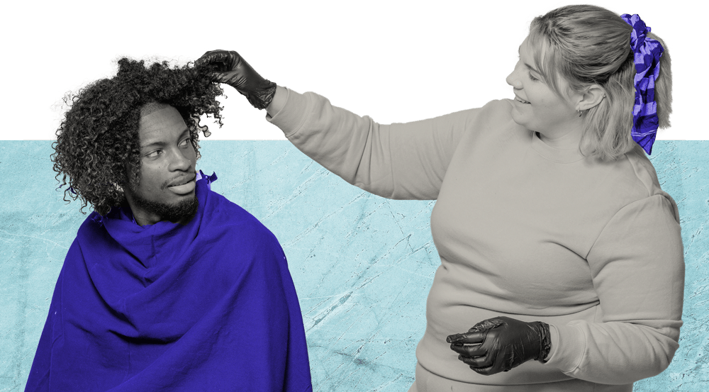 A stylist analyzing someone's hair