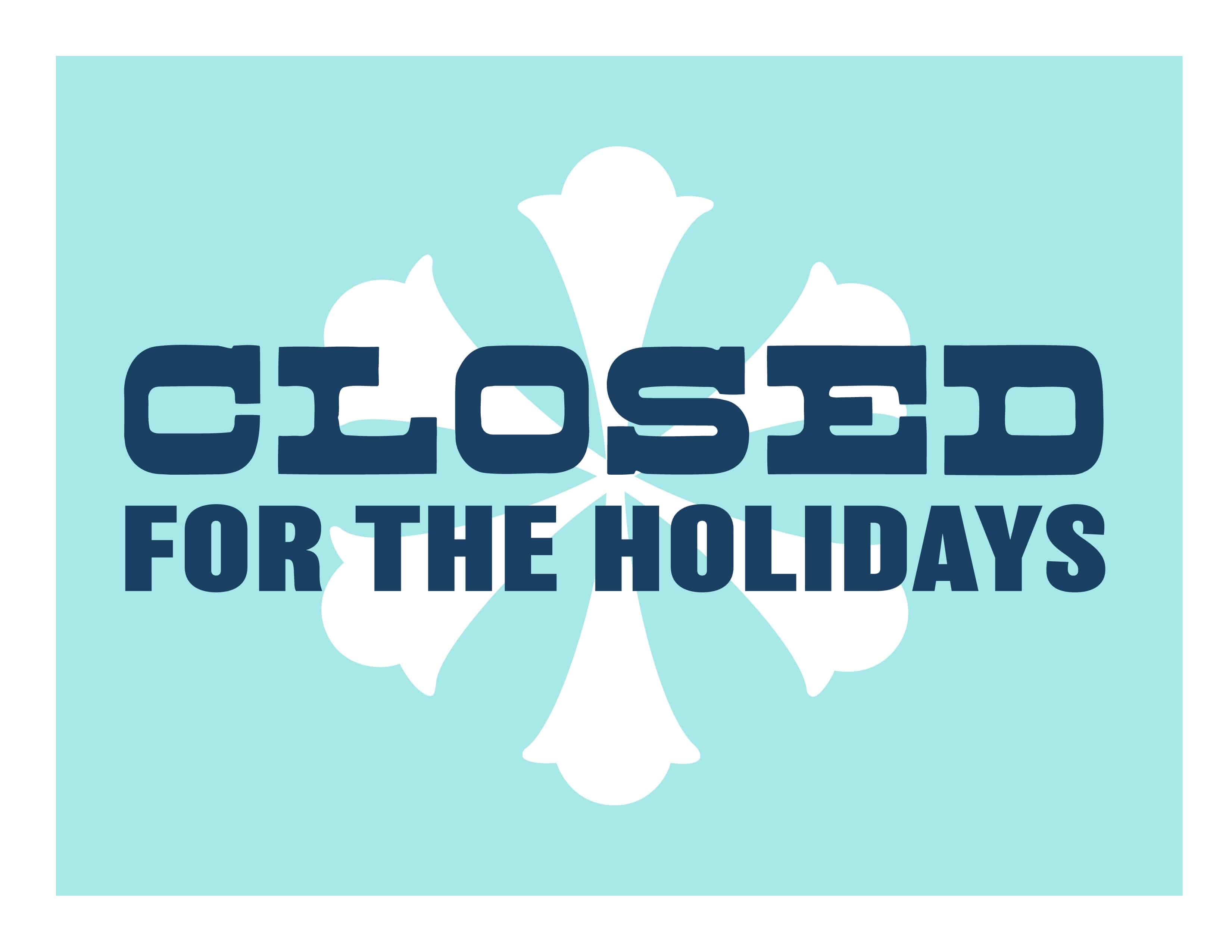 closed sign saying "closed for the holidays" and one large snowflake in the background