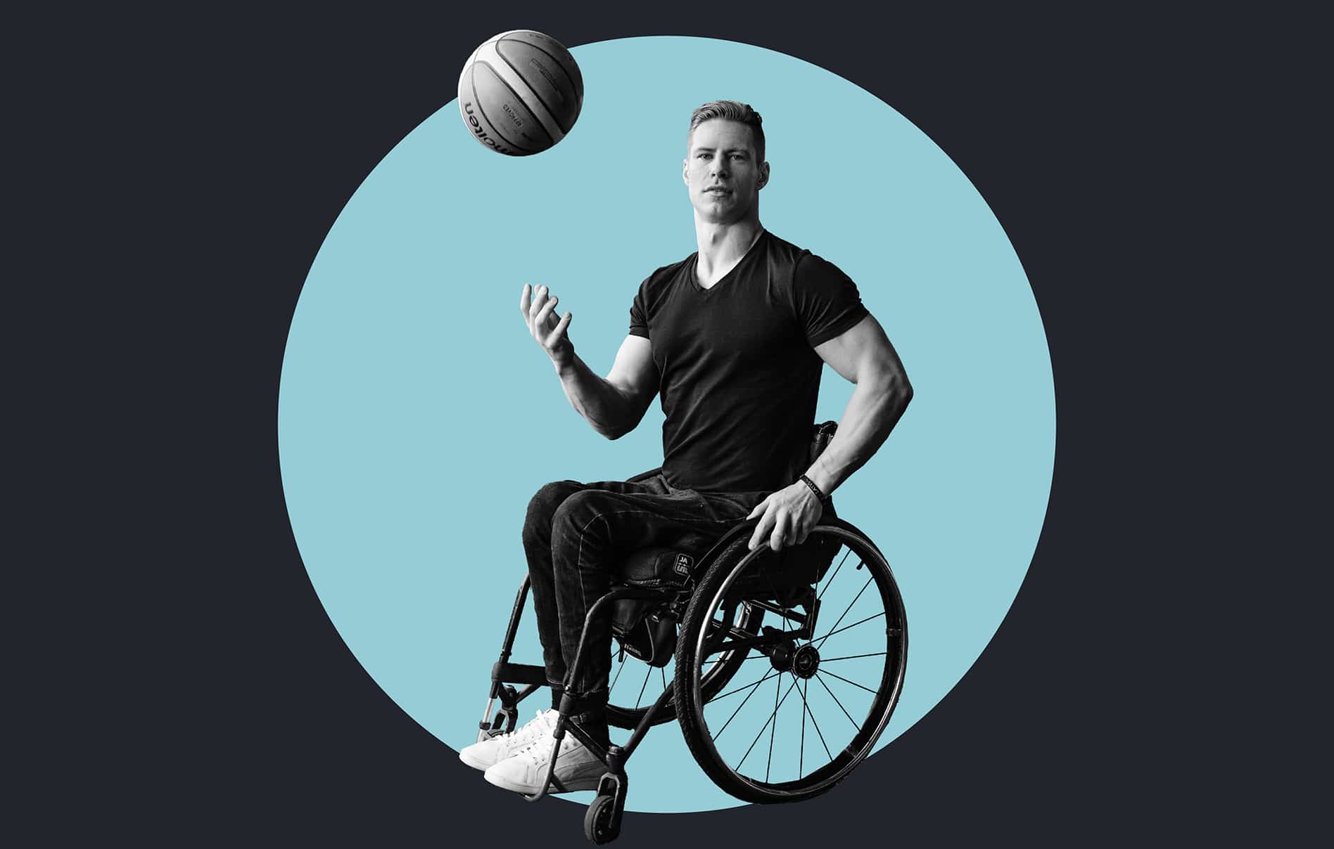 Person throwing a basketball in the air while in a wheelchair